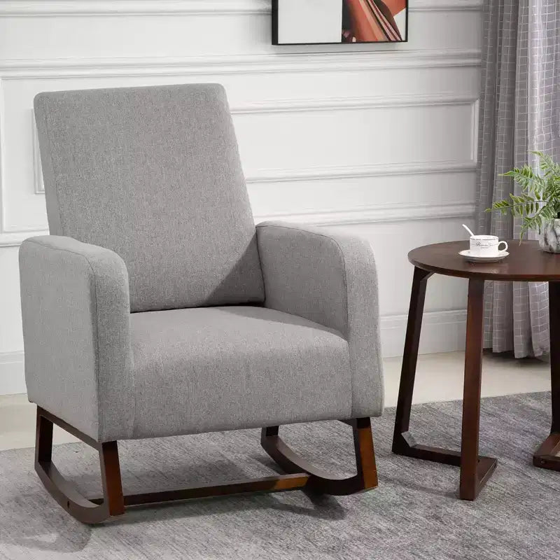 Sedia a dondolo Accent Lounge con base curva in legno massello e seduta imbottita in lino