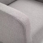 Sedia a dondolo Accent Lounge con base curva in legno massello e seduta imbottita in lino